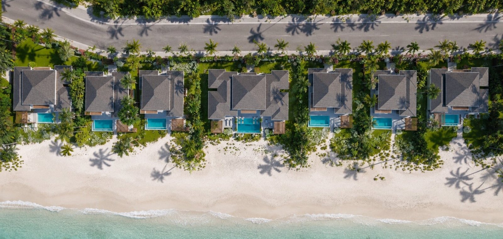 Aerial rendering showing the row of seven Oceanfront Villas along the beach in Blue Hills, numbered left to right